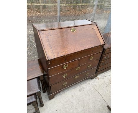 A GEORGE III OAK FALLFRONT BUREAU WITH FITTED INTERIOR, TWO SHORT AND THREE LONG DRAWERS, ON BRACKET FEET, 36" WIDE 