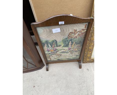 AN OAK AND TAPESTRY FIRESCREEN 