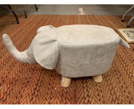 A FAUX SUEDE ELEPHANT FOOT STOOL 