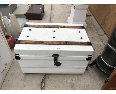 A METAL PAINTED TRUNK WITH WOOD AND METAL BINDINGS ON TOP 70CM W X 44CM H X 48CM D 