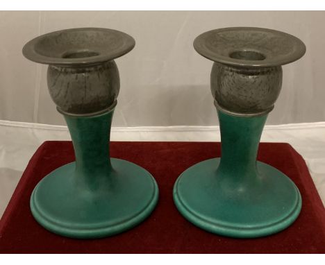 A PAIR OF 1930'S PILKINGTONS LANCASTRIAN POTTERY GREEN BASED CANDLESTICKS WITH TWO PIECE HAMMERED PEWTER TOPS SHAPE 3316 