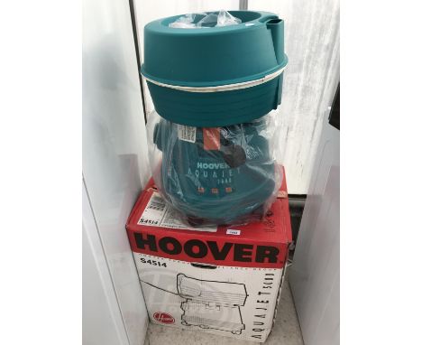 A HOOVER COMBINED WET AND DRY CARPET CLEANER BELIEVED IN WORKING ORDER BUT NO WARRANTY 