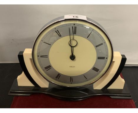 A VINTAGE BLACK AND CREAM 'SMITHS' MANTEL CLOCK 