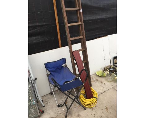 A WOODEN LADDER, TWO FOLDING SEATS, A ROLL OF PIPE AND A SHELF 
