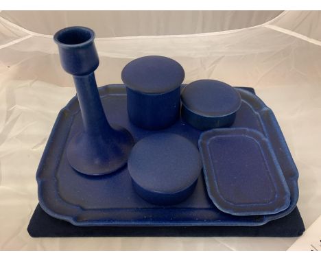 A PILKINGTONS LANCASTRIAN POTTERY BLUE DRESSING TABLE SET COMPRISING OF A TRAY, A SMALLER TRAY, A CANDLESTICK IMPRESSED 1911 