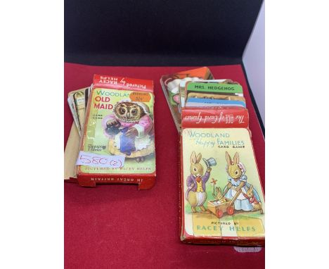 TWO VINTAGE PACKS OF CARDS WOODLAND OLD MAID WITH ORIGINAL PRICE TAG AND WOODLAND HAPPY FAMILIES BOTH PICTURED BY RACEY HELPS