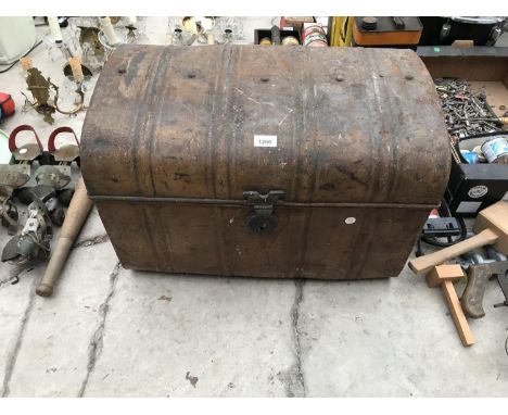 A VINTAGE METAL TRAVEL TRUNK 