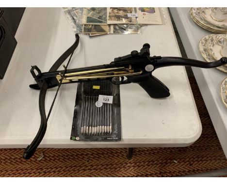 A WORKING MODEL OF A CROSS BOW TO INCLUDE PLASTIC PISTOL BOLTS 