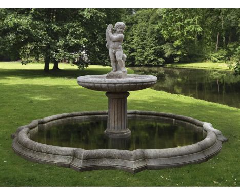 A Continental sculpted marble garden fountain, late 18th/early 19th century, the figural fount carved as a standing putto hol