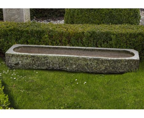 A carved limestone trough, 19th century, of rectangular form, 22cm high, 180cm long, 40cm wide Bidders from the UK and outsid