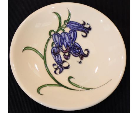 Moorcroft coaster in the Blue Harmony pattern, D: 12 cm. P&P Group 1 (£14+VAT for the first lot and £1+VAT for subsequent lot