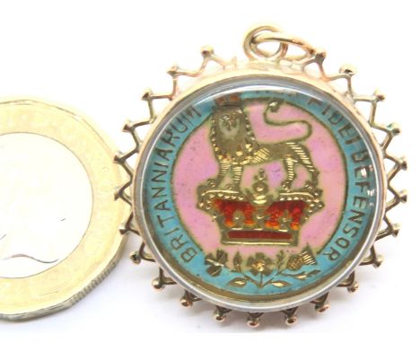 9ct gold bound pendant with enamel and gilt shilling. P&amp;P Group 1 (£14+VAT for the first lot and £1+VAT for subsequent lo
