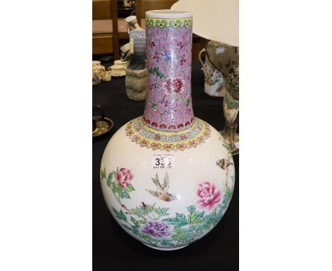 19thC large bulbous Chinese vase with bird and flower decoration, drilled for lamp base, H: 44 cm. Not available for in-house