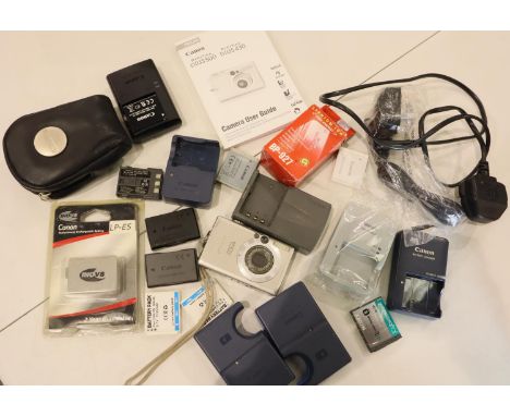 Canon IXUS digital camera with 10 x Canon batteries, 7 x Canon battery chargers of various types &amp; other Canon accessorie