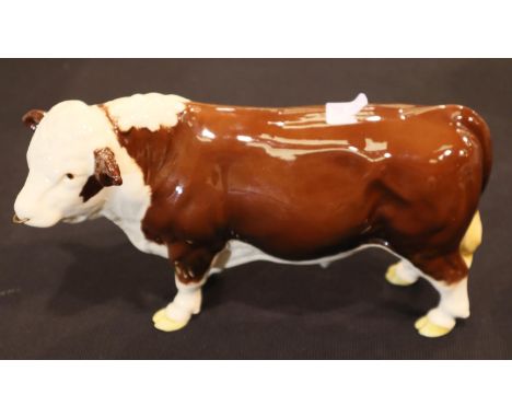 Beswick Hereford Bull, L: 23 cm. P&amp;P Group 2 (£18+VAT for the first lot and £3+VAT for subsequent lots) 