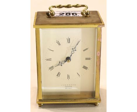 Junghans Meister Ato-mat brass battery powered carriage clock. P&amp;P Group 2 (£18+VAT for the first lot and £3+VAT for subs