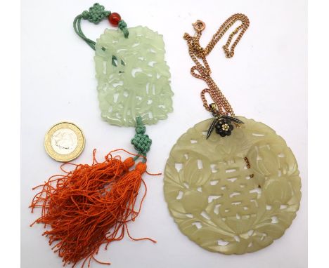 Two large carved jade discs, largest D: 8 cm. P&amp;P Group 1 (£14+VAT for the first lot and £1+VAT for subsequent lots) 