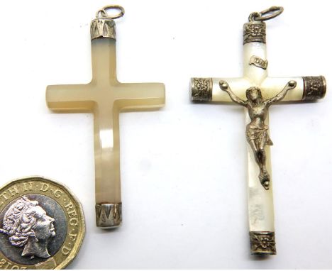 Two jade cross pendants, each H: 5 cm, combined 10.9g. P&amp;P Group 1 (£14+VAT for the first lot and £1+VAT for subsequent l