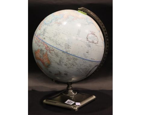 Replogle 12 inch revolving globe on a cast metal base. P&amp;P Group 3 (£25+VAT for the first lot and £5+VAT for subsequent l