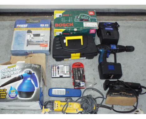 A quantity of tools to include Powercraft nail gun, Bosch sander, Prolex power steam cleaner, two bit sets, DeWalt grinder, B