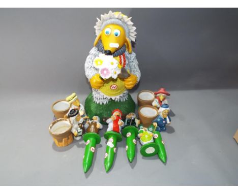 Wombles - a collection of garden related memorabilia to include a Madame Cholet garden gnome approximately 37 cm height, four