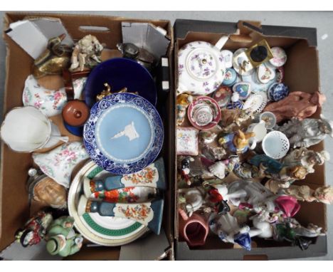 A quantity of ceramics and glassware contained in two boxes, to include Royal Worcester, Wedgwood Jasperware, Heron, Bossons,