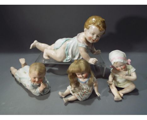 Piano Babies a - large ceramic hand painted Piano Baby in a crawling position approximate height 15 cm x 18 cm, a further cra
