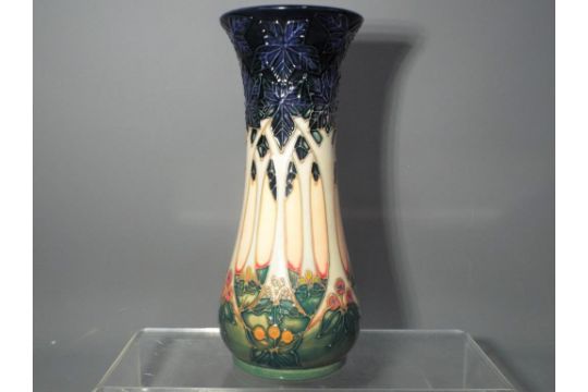 Moorcroft - A Moorcroft Pottery slender form vase decorated in the ...