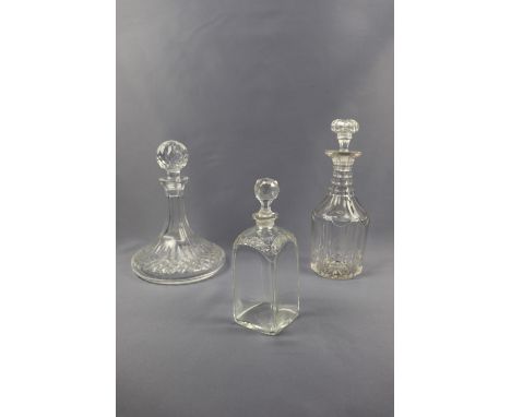 A contemporary cut glass Rodney / ship's decanter together with an early Victorian heavy cut glass wine decanter and a late G