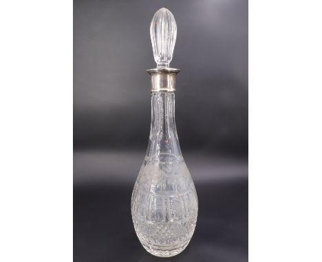 A QEII silver-collared cut glass wine decanter, of Indian club form, 38.5 mm