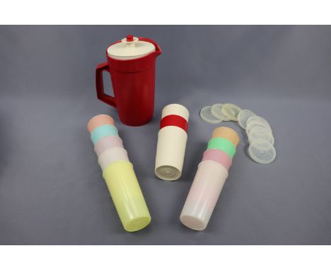 Vintage Tupperware lidded beakers and a jug, circa 1960s - 1970s