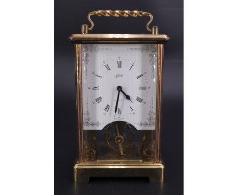 A carriage type clock by Schatz &amp; Sohne, having an exposed vertically aligned balance wheel, circa 1960s, 13 cm excluding