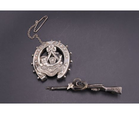 A Boer War Yorkshire Light Infantry silver sweetheart brooch together with an 1899 silver rifle-form brooch