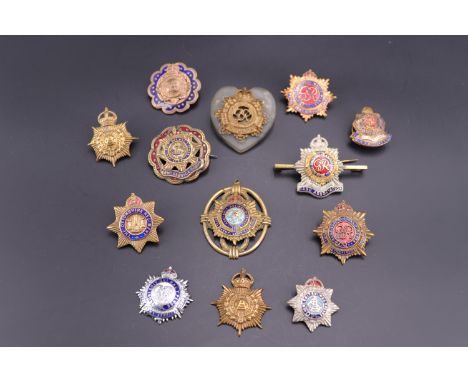 A quantity of Army Service Corps / RASC sweetheart brooches etc
