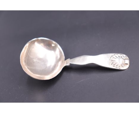 A George III silver shell pattern caddy spoon, W.J, Sheffield