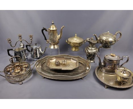 A quantity of Victorian and later electroplate including two galleried trays, candelabra, egg cups and stand etc