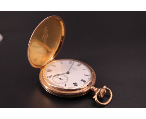 An early 20th Century Elgin rolled gold hunter pocket watch, the inner cover bearing an engraved presentation inscription to 