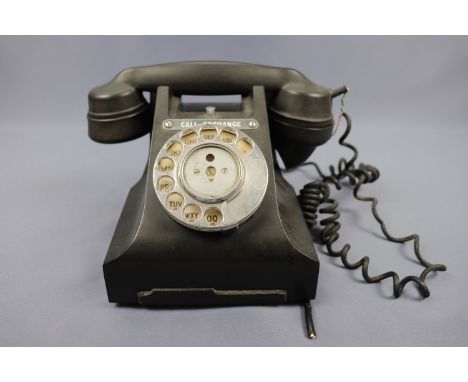 A vintage black Bakelite telephone