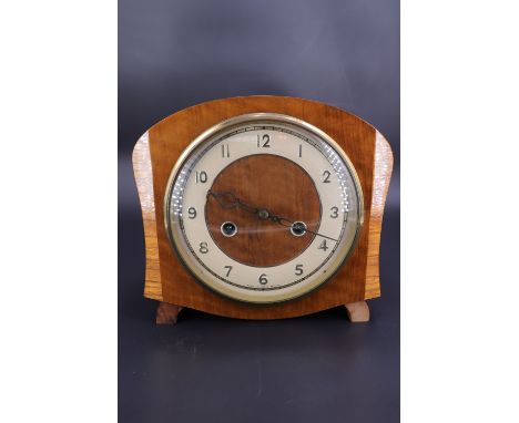 A 1950s Smiths cross-banded walnut mantle clock, having a two-train movement