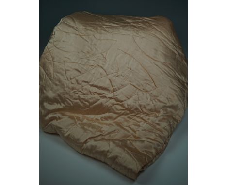A vintage quilted satin double bedspread