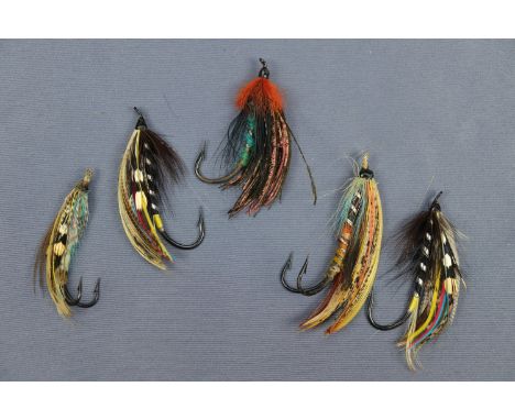 Five vintage salmon fishing flies hand-tied by Hughie Gilchrist, former gamekeeper at Warwick Hall, Carlisle