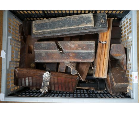 Vintage woodworking tools including moulding and other planes