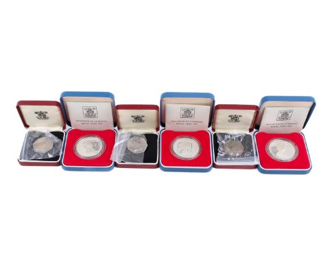 A collection of coins. Noting three 1978 Guernsey coins, three silver proof crowns and 1973 50p pieces etc.