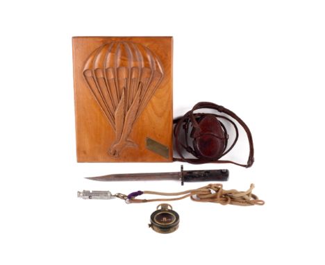 Selection of military related collectables including knife, whistle, compass etc