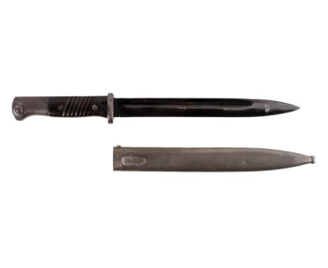 A German WWII K98 bayonet by Berg & Co. The guard marked N17835, the blade marked Berg & Co, 9597 over C and 39 to side of bl