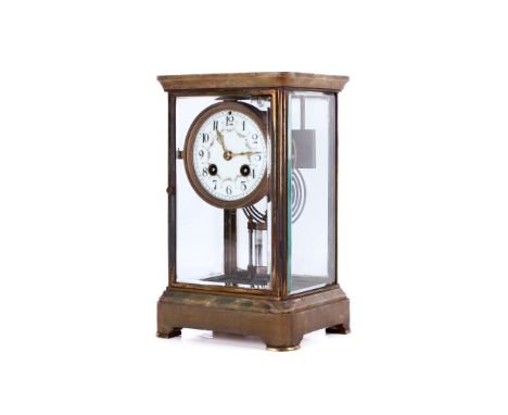 A 20th Century French eight day green marble mantel clock.  White enamel dial, Arabic numerals with floral swags, mechanism #
