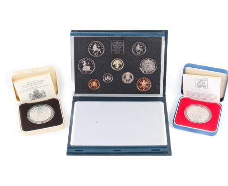 A group of GB coins. Including a 1992 proof set and two silver proof crowns dated 1977 & 1980