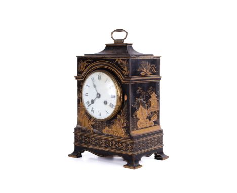 A French early 20th c Chinoiserie laquered mantle clock. Enamel dial with Roman numerals, striking on a gong. Made in France 