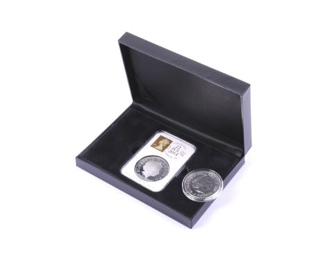 Two silver coins. Including 2014 silver proof £5 coin and 2015 Britannia £2 coin.