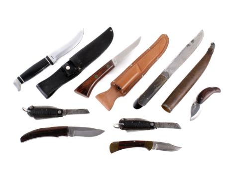 Eight assorted hunting knives and pen knives. Including two USA examples, one pen knife by Le Berger, the rest unmarked. 